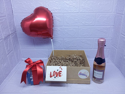 BASE DE REGALO CON CHOCOLATES Y ESPUMANTE