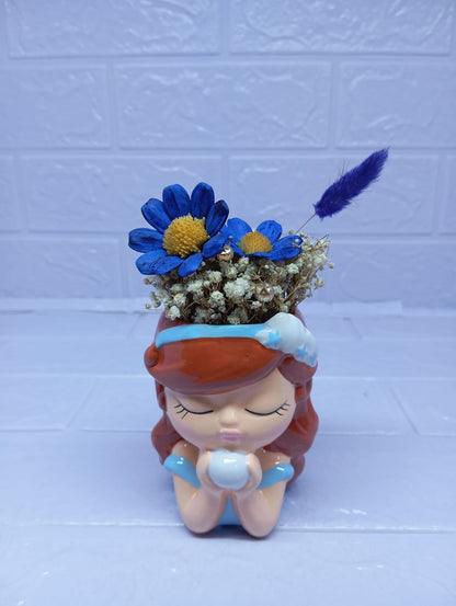 MUÑEQUITA ENCANTADA