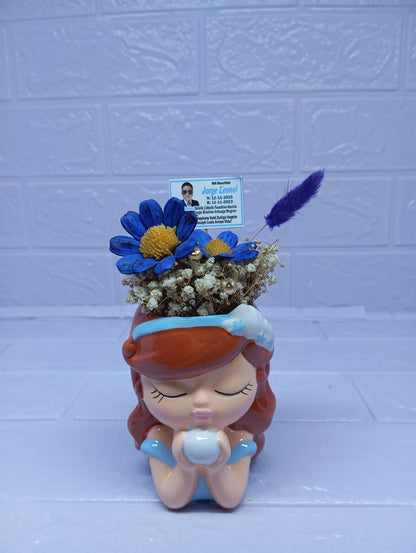 MUÑEQUITA ENCANTADA