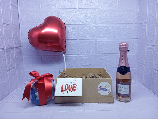 BASE DE REGALO CON CHOCOLATES Y ESPUMANTE